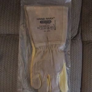 Never used dog training gloves.  Still in original zip bag w/o tags